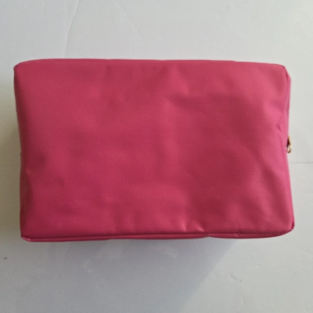 Pink Zipper Pouch with Embroidered Disney Design.